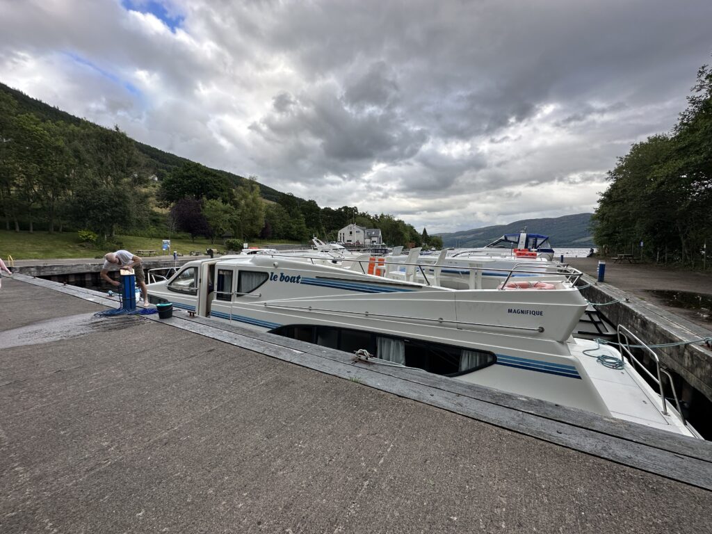 The Magnifique houseboat from Le Boat's comfort line moored in Urquhart Bay in Drumnadrochit, Scotland